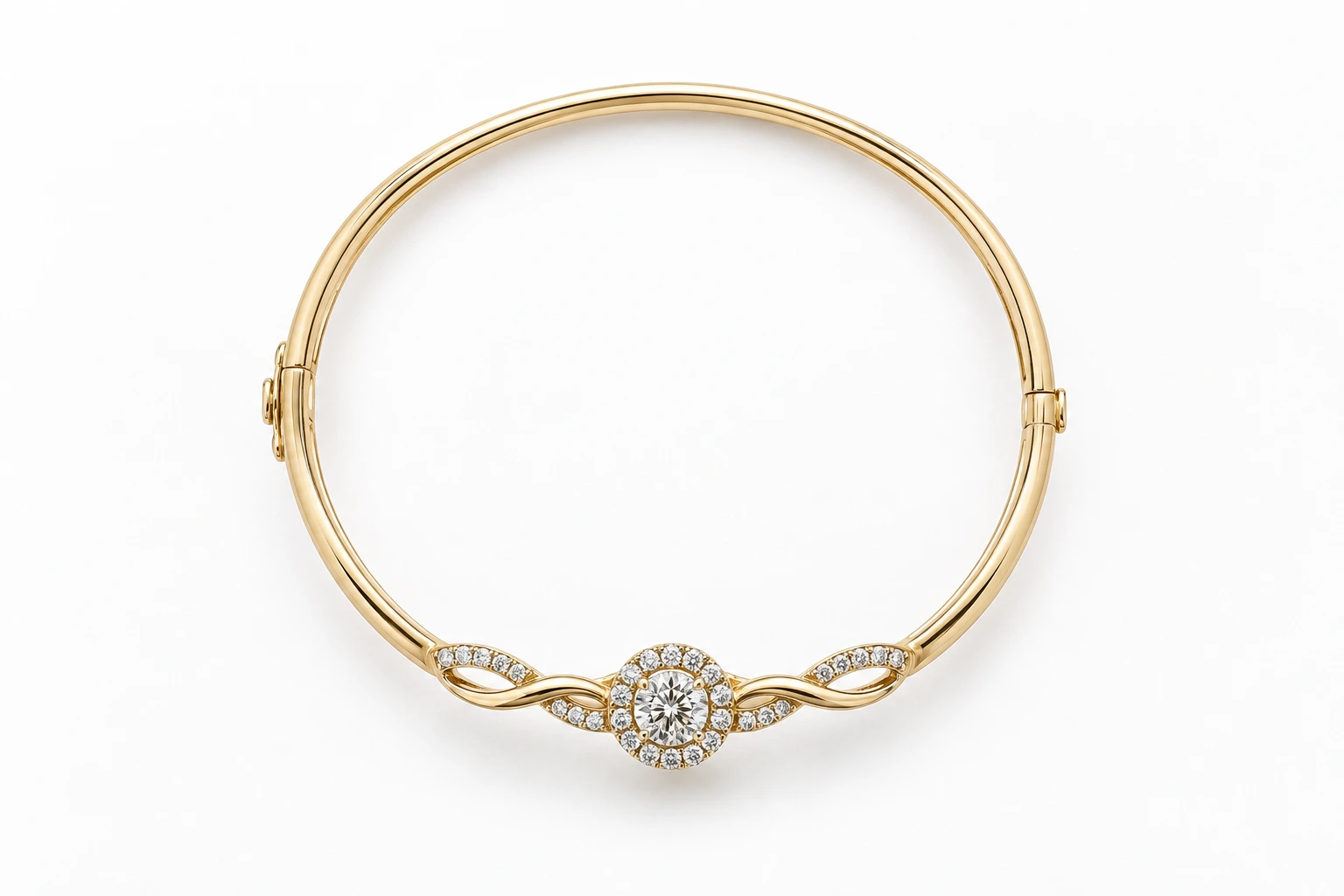 Gold bangle seen from above on white, hinge hardware at both sides, haloed round stone below.